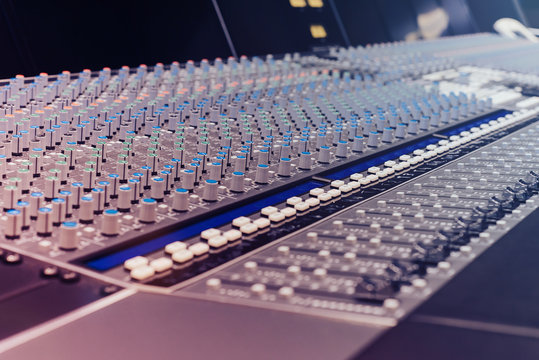 Professional sound mixing table at the recording Studio. Toned.