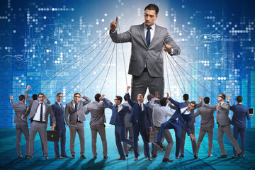 Boss employee manipulating his staff in business concept