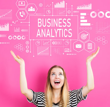 Business Analytics with young woman reaching and looking upwards