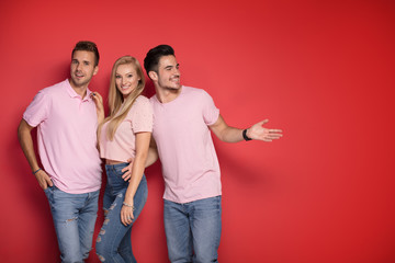 Obraz premium One blonde girl with two handsome men.