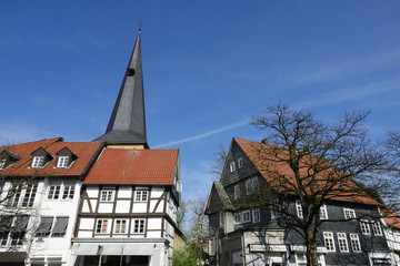 Fototapeta na wymiar Historische Fachwerk Gebäude mit Apostelkirche in Gütersloh Westfalen Deutschland