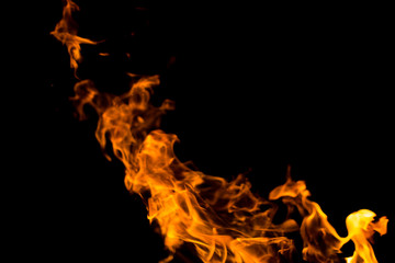 Flame of fire with sparks on a black background