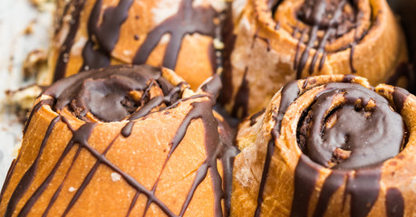 Close up photo of a chocolate roll pastry dessert cake sweet at a street food market