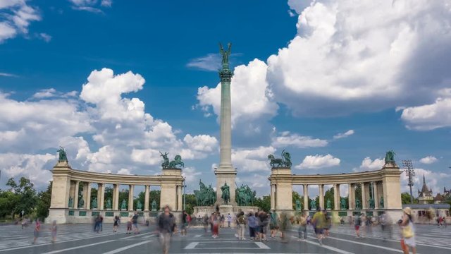 Heroes' Square (Hősök tere with Millenniumi emlékmű) in Budapest with a crowd of people at summer day. Time lapse