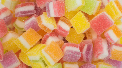 colorful candy and jelly sweet close up, Square shape jelly candy flavor fruit, candy dessert colorful on sugar