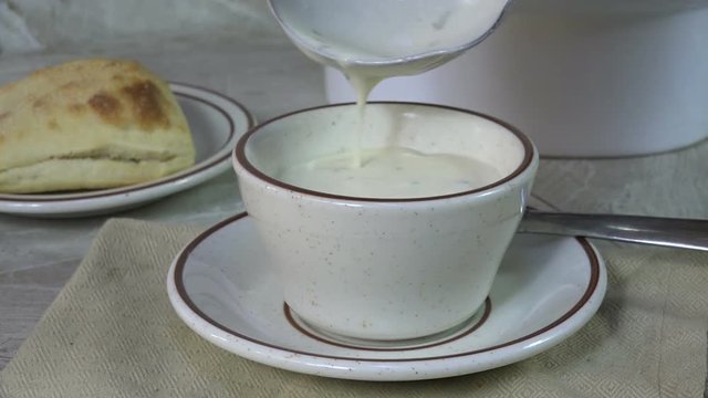 Serving New England Style Clam Chowder
