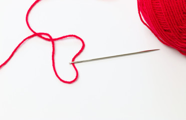 Red yarn design of heart shape for love.