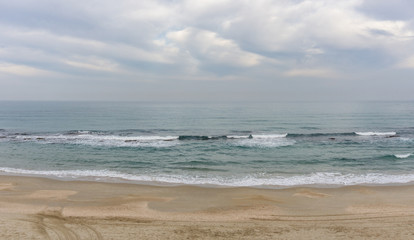 Fototapeta na wymiar Sandy beach at mediterranean sea in Israel.