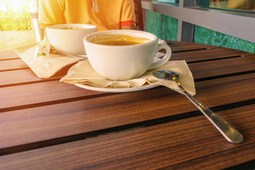 coffee cup on the wood table background