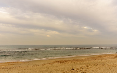 Fototapeta na wymiar Sandy beach at mediterranean sea in Israel.