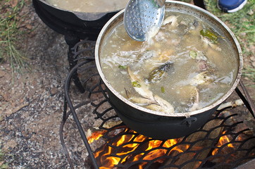 Ear cooked in a cauldron at the stake