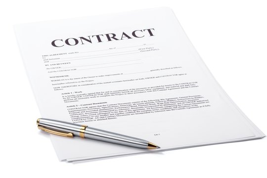 Ballpoint pen on top of a contract
