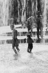 Children bathe in a fountain in a new park in South Butovo. Moscow. Russia