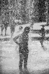 Children bathe in a fountain in a new park in South Butovo. Moscow. Russia