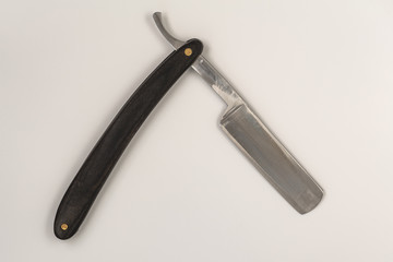 Sharp straight razor on white background. Vintage razor