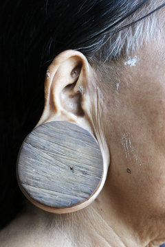 Earring In Wood Of Ethnic Woman In Borneo , Malaysia