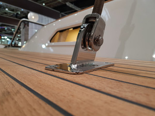 Metal bracket for fastening the steel shroud to the deck of the sailing boat.