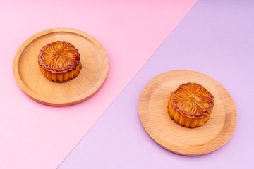 Mooncakes with a pink and purple background