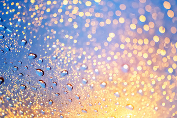 Beautiful water drops on window glass and many bokeh in night light. Water drops on rainy day  for background.