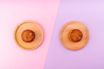 Mooncakes with a pink and purple background