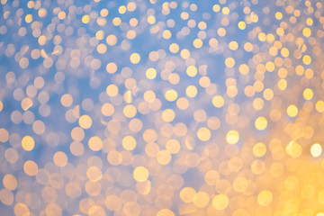 Blur of beautiful water drops on window glass and many bokeh in night light. Water drops on rainy day  for background.