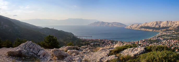 Fototapeta na wymiar Panoramatic view to city Baska with sea, Croatia