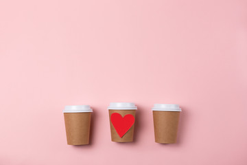 Three craft cups of coffee to go.