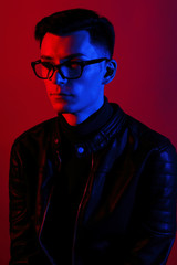 Fashion portrait of young man in glasses.