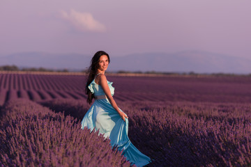 Fototapeta premium woman in lavender flower field