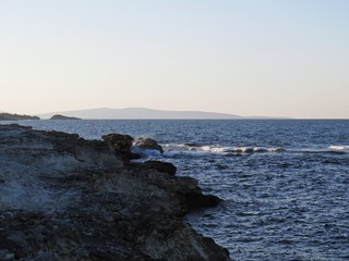 View at Sea Ocean with Big Waves Hitting on Rock Coastline Shore