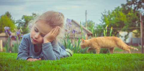 child and ginger cat 