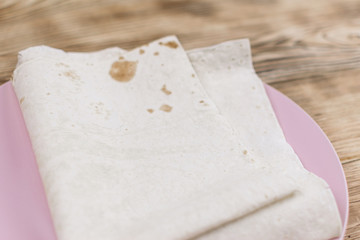 Armenian bread - lavash on the wood background