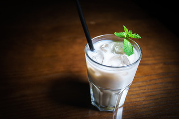 Coffee drinks on a black background. Coffee on a black table. Cold coffee. Latte. Cappuccino. Espresso. Coffee cocktails. Milkshakes. Whipped cream. Barista