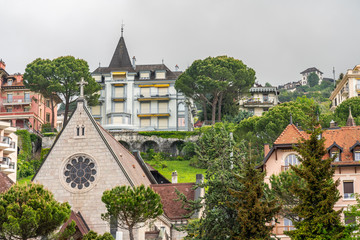 Fototapeta na wymiar Switzerland, Lozanna cityscapes and rooftops
