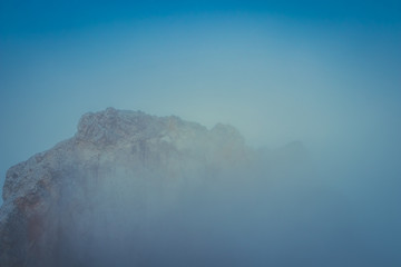 Top of Zugspitze mountain in the European Alps on a cloudy summer day