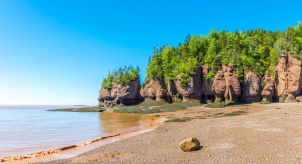 During the low tide of Bay of Funda, beautiful rock formations are revealed - Canada