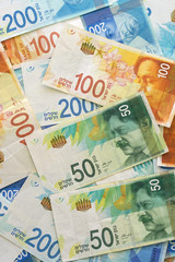 Israeli money stack of the new Israeli money bills (banknotes) of 50, 100 and 200 shekel. New Israeli Shekel series C.Israeli money notes