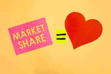 Word writing text Market Share. Business concept for The portion of a market controlled by a particular company Pink piece paper reminder equal sign red heart sending romantic feelings