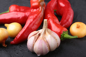 Red hot Chili pepper, garlic and onion. Fresh Organic vegetables.