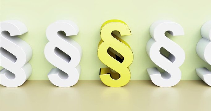 Golden paragraph sign in focus. Symbolic of searching and finding the right law