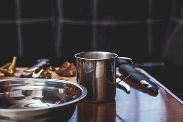 Hands cut raw mushrooms with sharp knife