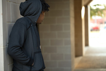 Young African American man in deep thought.
