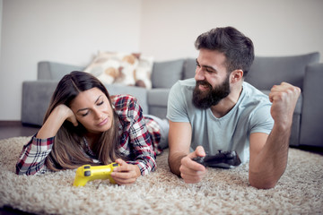 Obraz na płótnie Canvas Couple playing video game