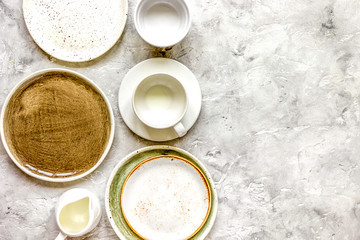 ceramic tableware top view on stone background mock up