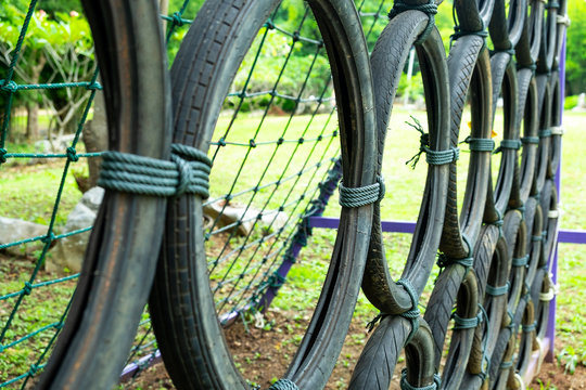 Old and Used Motorcycle tyres Crawl Constructions Obstacle Course in Outdoor Boot Camp