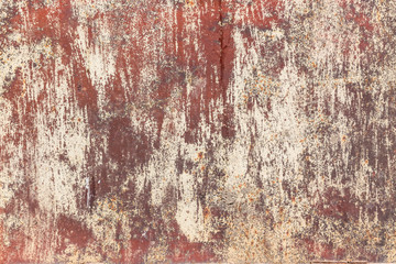 Rusty red metal texture background with cracked white paint. Abstract grungy texture pattern