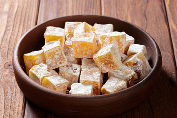 Turkish delight on a wooden table.