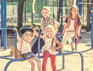 Fototapeta na wymiar Pupils spending time at school playground