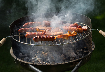 Unhealthy but tasty grilled sausages and meat