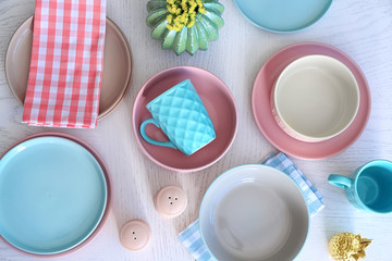 Plates and bowls on white table